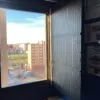 placa solar en ventana piso
